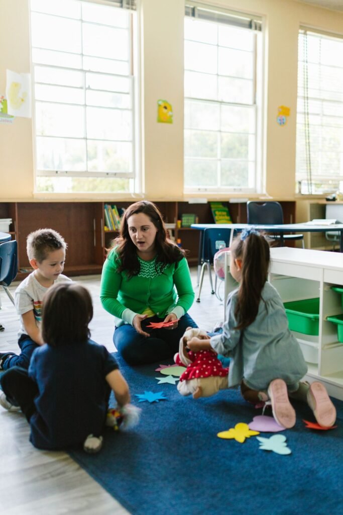 Teacher sharing a classroom activity with young children