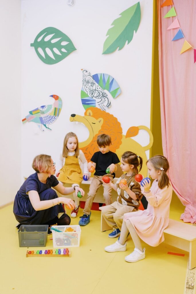 Children playing with colourful balls